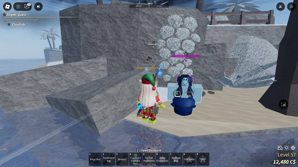 Een Fisch -speler staat naast een bubbelmermaid