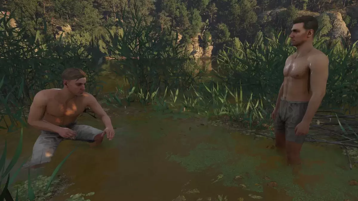 Kingdom Come Deliverance 2 포토 모드에서 갈대 사이에 웃고 있는 한스와 헨리